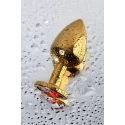 Gold anal plug TOYFA Metal with red round-shaped gem, length 7,8 cm, diameter 2,2-3,5 cm, weight 95 gr